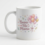 White mug with pastel balloons and the French message 'Bonne Fête Mamie' for grandma.