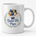White ceramic mug with a bouquet of balloons in blue, gold, and beige, and the French text 'Bonne Fête Papa' framed by a green laurel wreath.