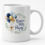 White ceramic mug with a festive wreath, blue/gold balloons, and a ribbon; text: 'Bonne Fête Papy' in blue script.